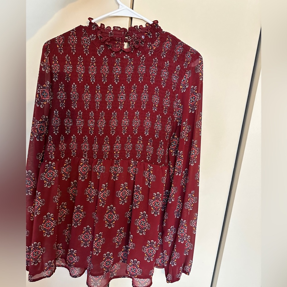 Sheer turtleneck blouse